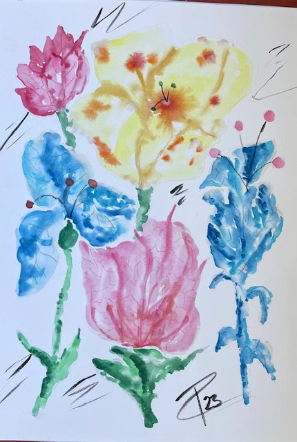 some flowers in yellow red and blue