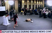 reporter falls over