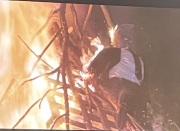burning the guy