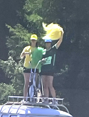 fans on the roof of their car
